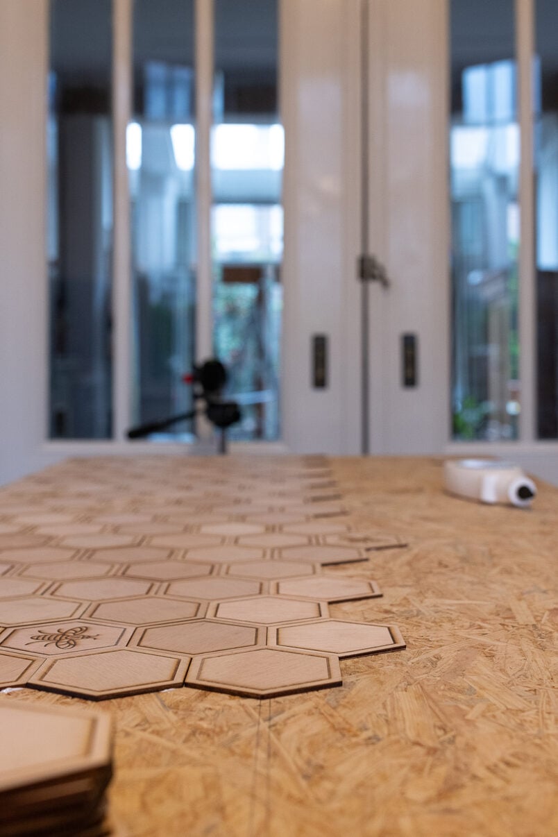 Assembling hexagons on wood countertop