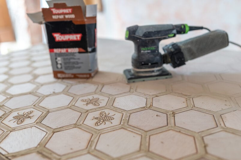 Sanding kitchen worktop made of plywood hexagons